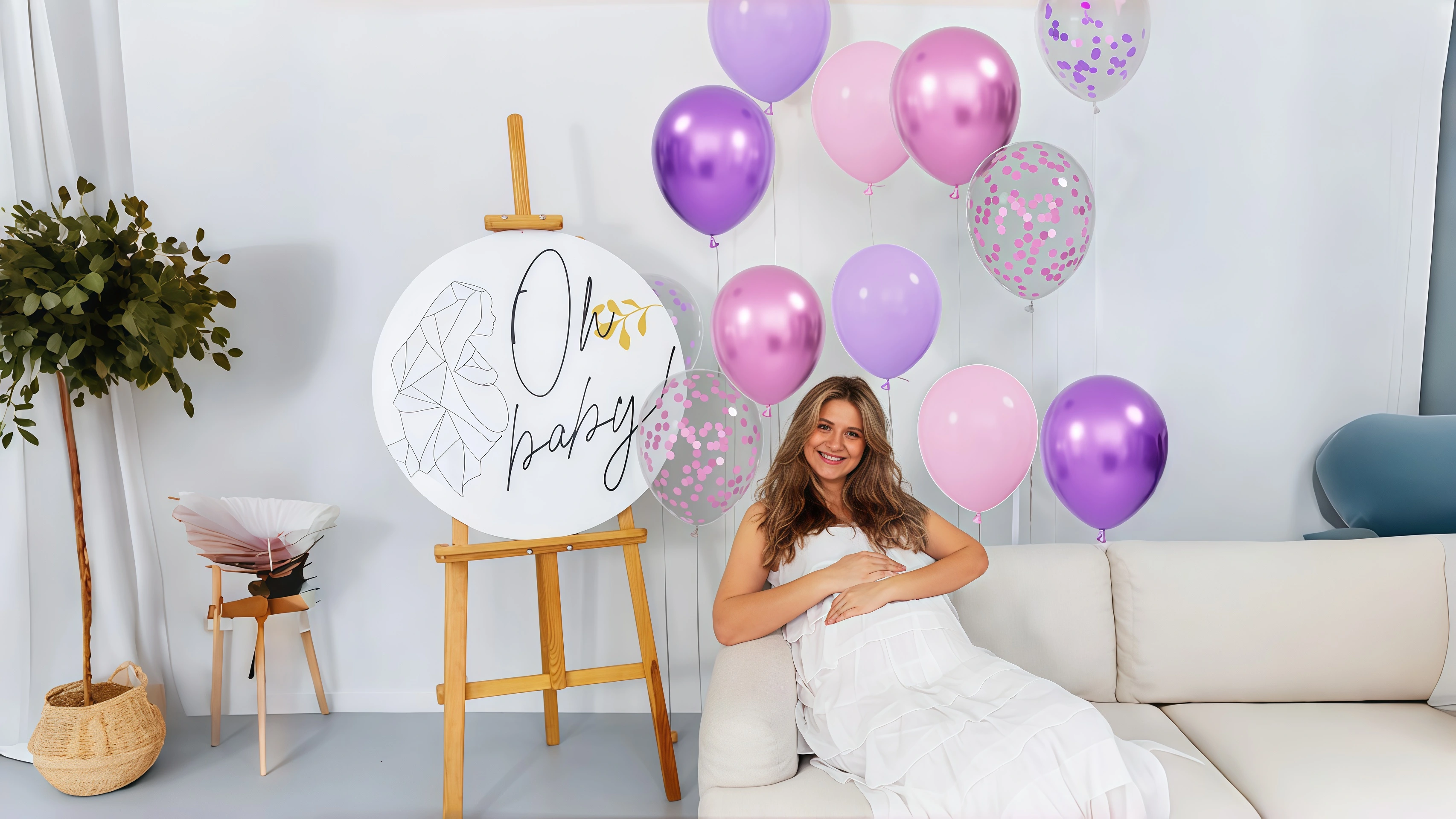 A cozy rental living room fully decorated with pink and purple balloons for a birthday party, with clusters on chairs, curtains, and floors