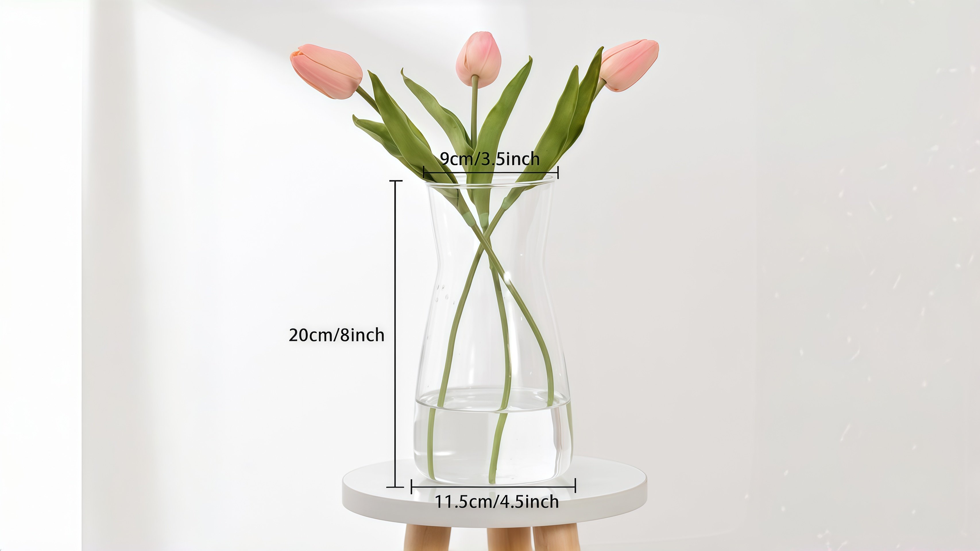 Clear glass flower vase with 8-inch height displayed alongside a wooden ruler, 3.5-inch upper opening and 4.5-inch wide base highlighted, stable round vase for bouquets and dried pampas grass